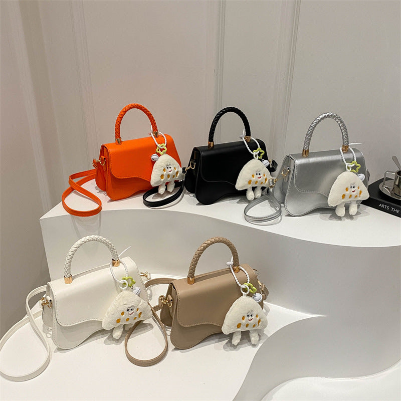 Stylish Mini Crossbody Bag with Plush Charm